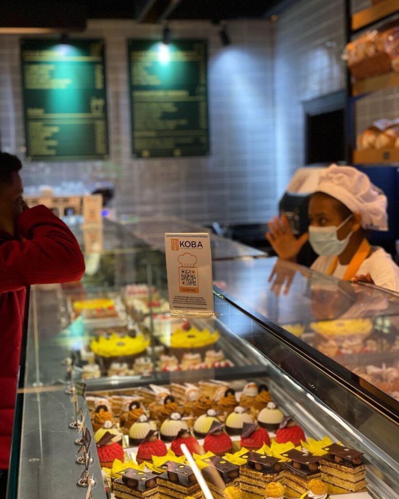 image containing qr-code and phone in ethiopia backery store